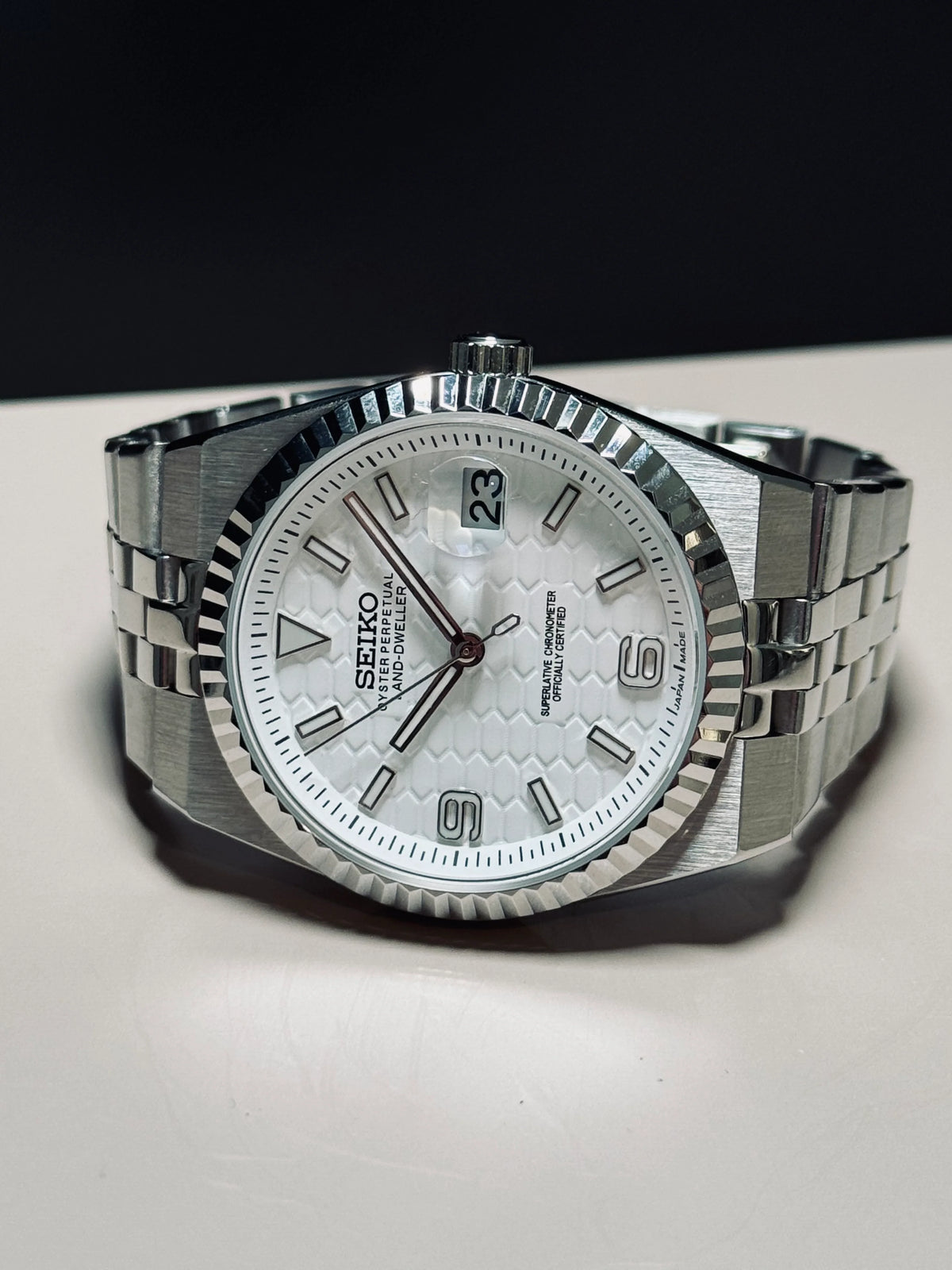 ORA Vanguard 36 white dial 36mm automatic watch – angled table shot