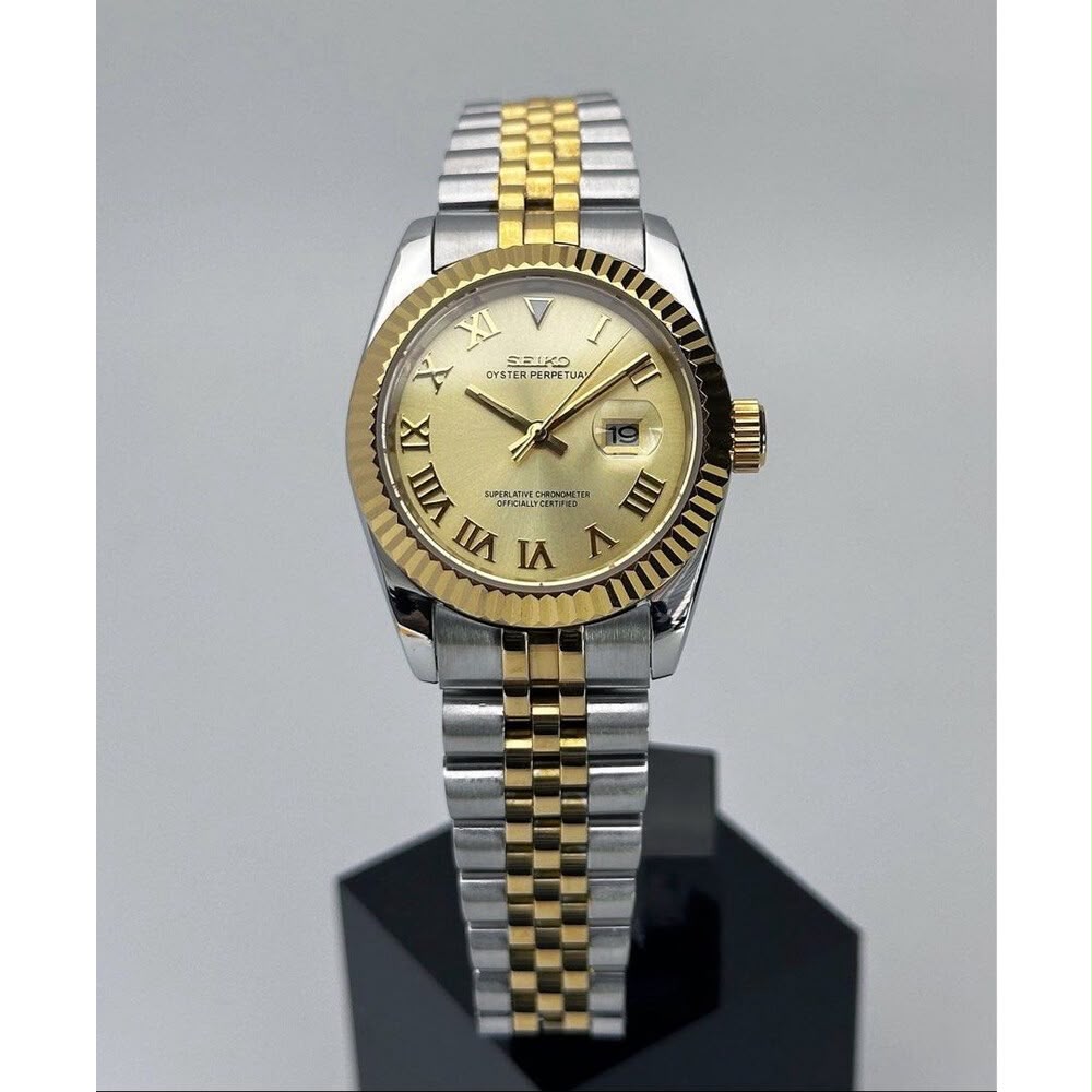 ORA Two-Tone Classic Date ladies Seiko Mod watch, yellow gold and steel, gold champagne Roman numeral dial, fluted bezel, 31mm/36mm