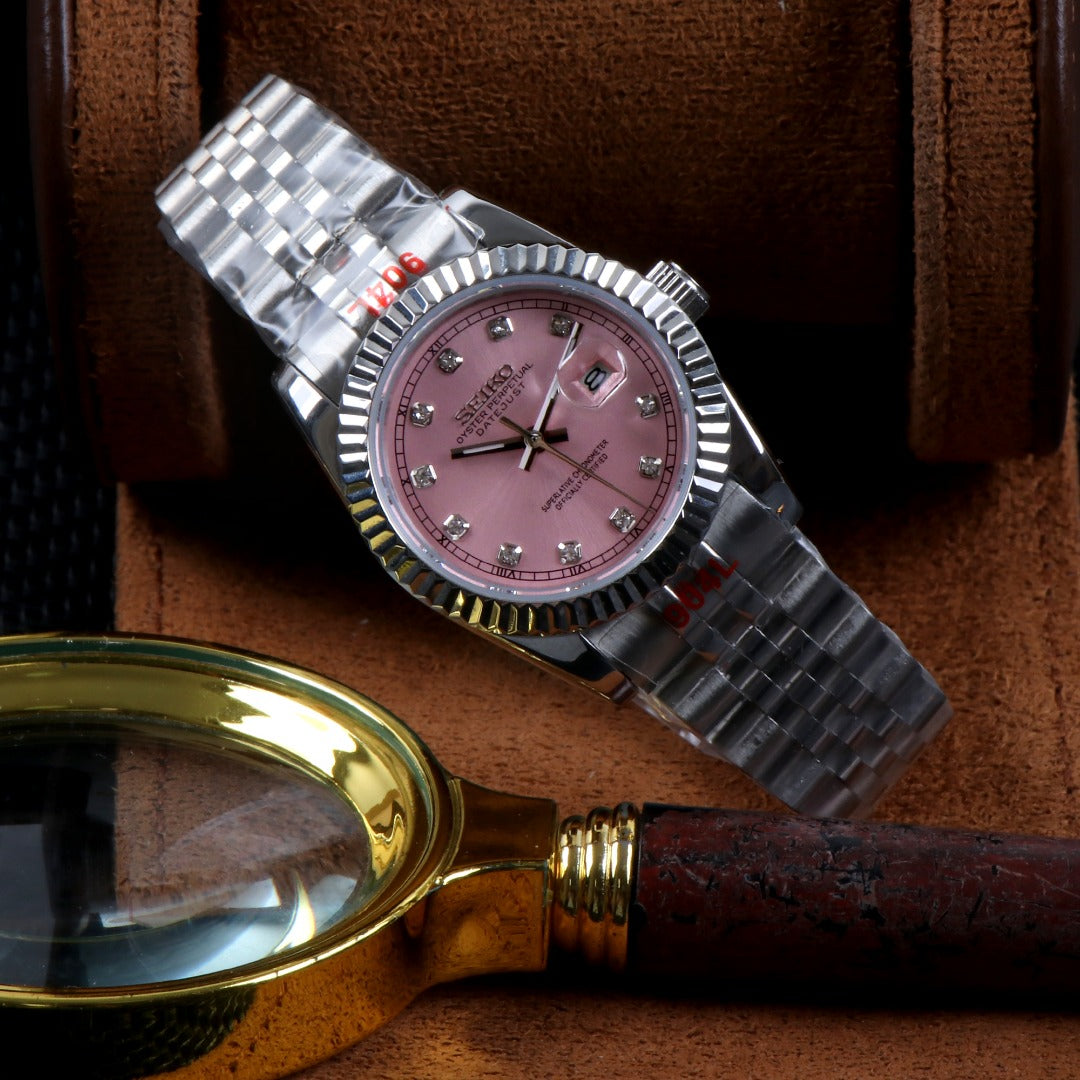 ORA Steel Classic Date ladies Seiko Mod watch, pink dial, diamond hour markers, fluted bezel, 31mm/36mm – angled view