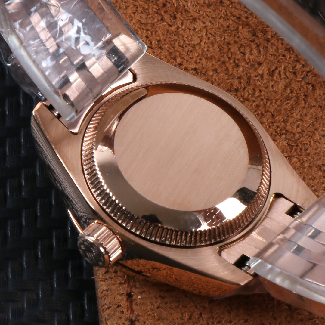 ORA Rose Gold Datejust ladies Seiko Mod watch, pink mother of pearl dial, diamond hour markers, 26mm – worn on the wrist